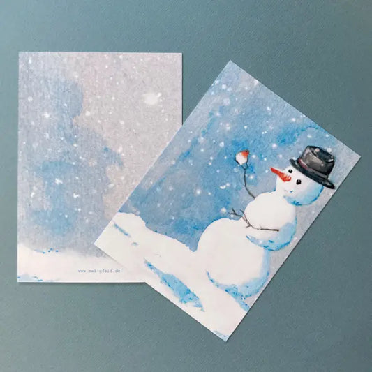 Schneemannpostkarte_mit_kotkehlchen_im_winter von der künstlerin Kathi Bertram (meigfeid)